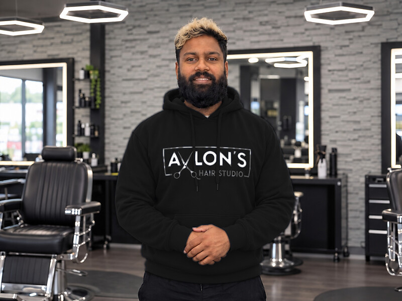 Reagan Fernandes, owner of Avlon's Hair Studio, in the shop